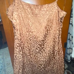 Silky mini length dress with cheetah print detail!